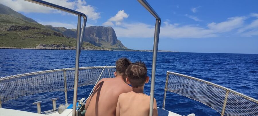 San Vito Lo Capo: Boat Trip with 3 Swimming Stops and Snacks - The Guide, the Language, and How English Still Sneaks In