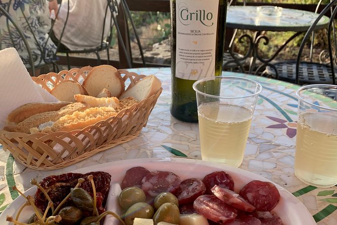 Sciara del Fuoco from the sea with an aperitivo to Ginostra, boat tour - Stromboli by water: why this starts at the Pontile