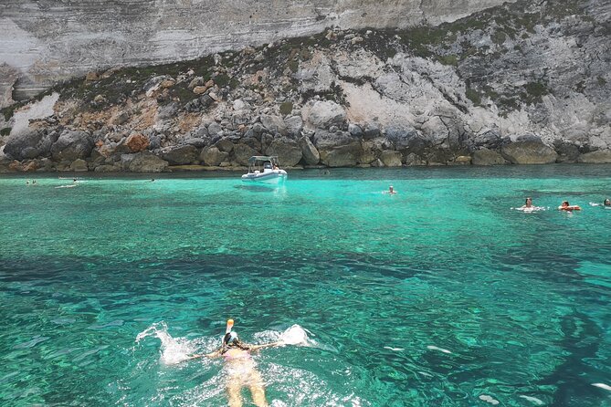 SciatumiaDay boat tour to Lampedusa with typical lunch - North-coast variety: Sacramento Stack, Muro Vecchio, and Punta dell’Acqua