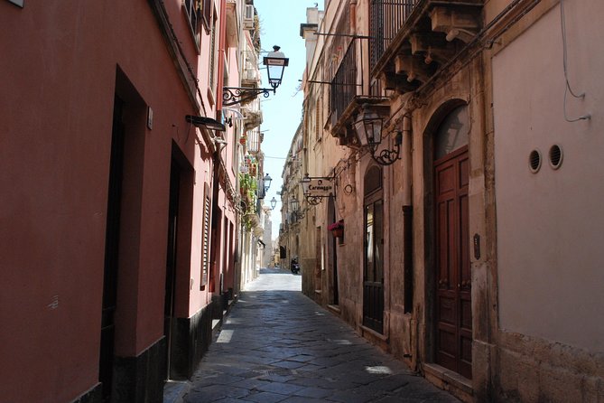 Sicilian Food tour and wine tasting in Ortigia in Syracuse - Guides who connect bites to place: Ericka, Sebastian, Sebastiano, Pietro