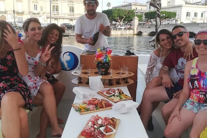 Siracusa Boat excursion island of ortigia and sea caves - Aperitivo of local wines and cheeses: value, and a small caution