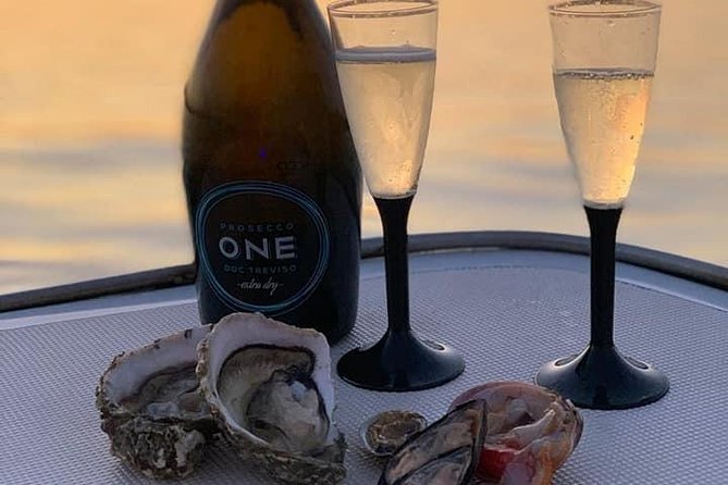 Syracuse Aperitif boat at Sunset island and sea caves - Music, Umbertine Bridge, and an Easy Return to the Dock
