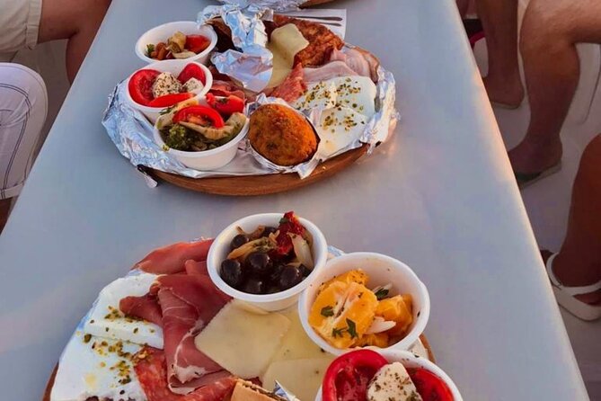 Syracuse: Boat tour with Aperitif 2 hours - Aperitif on board: Sicilian bites, Prosecco, and a possible swim