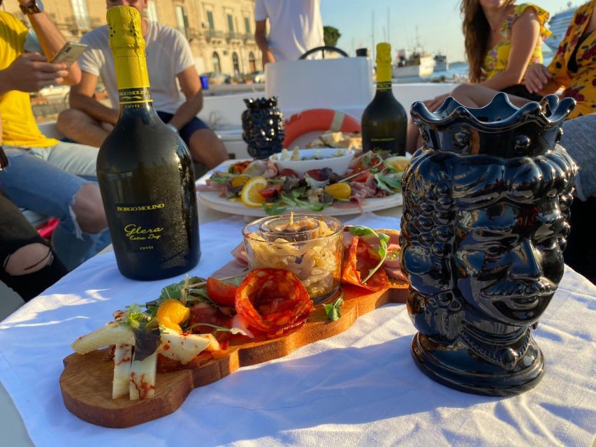 Syracuse: Boat tour with aperitif - What the boat experience feels like (sun, shade, and onboard basics)