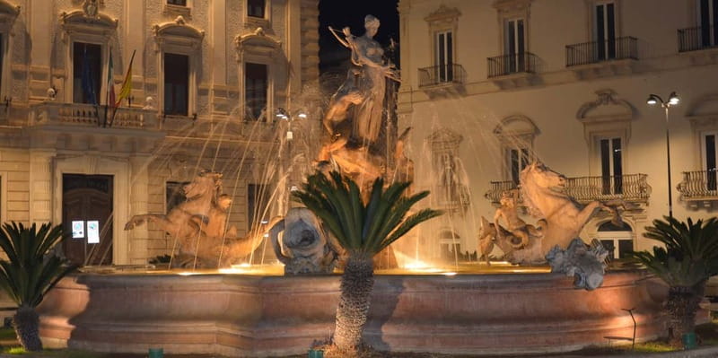 Syracuse: Ortigia and Neapolis Guided Walking Tour - Neapolis archaeological park: theaters, Latomia, and the Ear of Dionysos