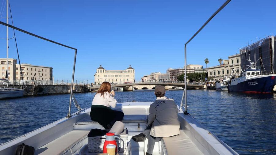 Syracuse:Ortigia, Sea Caves Winter Boat Tour + Tea & Blanket - Ortigia looks its best from the sea in winter light
