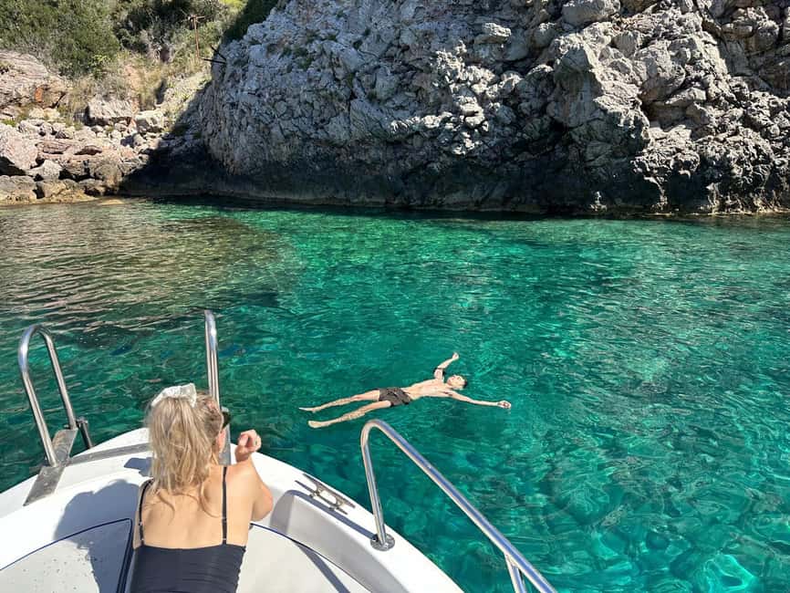 Taormina: Boat Tour with Sicilian Wine Tasting - Blue Grotto stop: quick look, camera-ready coastline