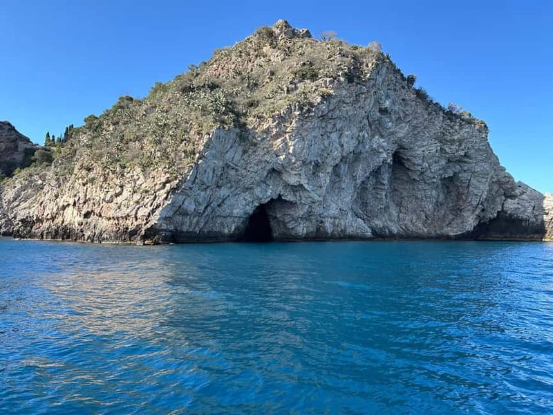 Taormina: Boat Tour with Sicilian Wine Tasting - The boat experience: shade, snorkeling gear, and crew energy