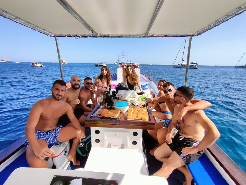 Taormina: Coastal Highlights Cruise with Wine & Food Tasting - Food on board: Mt. Etna salami and cheeses you can taste the source in