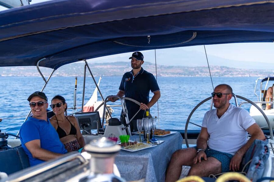 Taormina: Sailing boat tour with aperitif included - Getting your sea legs: what the crew actually does