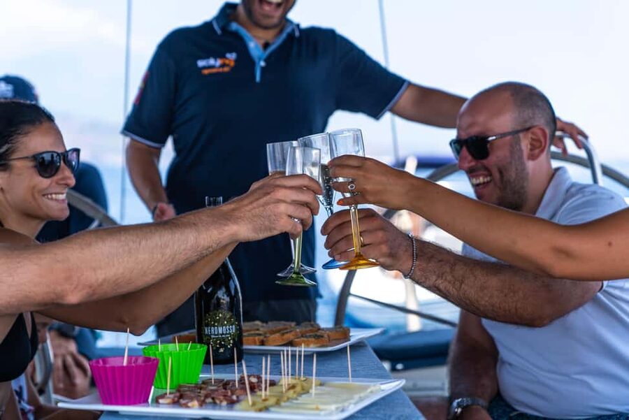 Taormina: Sailing boat tour with aperitif included - Spisone: the first taste of the coast and snorkeling time