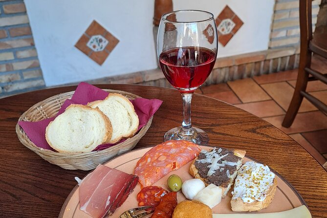 Taormina: Sicilian Street Food & Wine Tour by Do Eat Better - Stop 2 by the Ancient Theatre: arancino, plus a dose of Taormina scenery