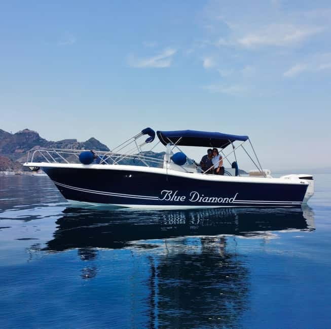 Taormina: Sunset Boat Tour with Dolphin Watching & Aperitif - Isola Bella and the Clear-Water Swim/Snorkel Stop