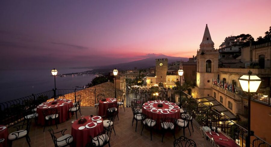 Taormina: Sunset Walking Tour & Aperitif on Rooftop Terrace - The rooftop aperitif: Etna-smoke views and a light, smart finish