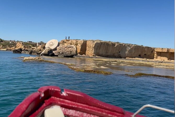 Tour of the island of Ortigia and the Plemmirio reserve - Syracuse sea caves: stalactites, coral shapes, and real coastline drama