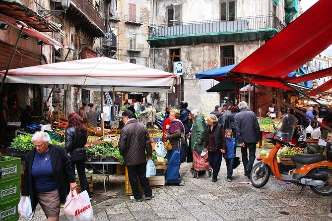 Wanna be Sicilian: Palermo Cooking Class and Market Tour - The lunch table: wine, Marsala, and a sit-down reward